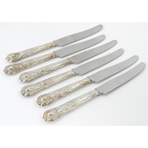 558 - A cased set of six silver handled King's pattern tea knives, hallmarked Sheffield 1966, maker Harris... 