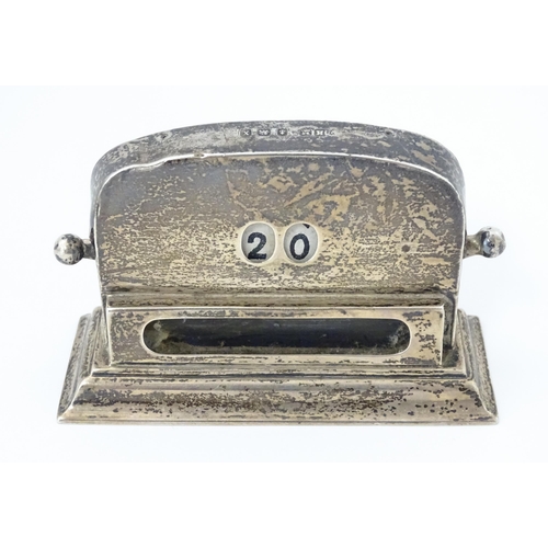 263 - A silver mounded desk calendar hallmarked Birmingham 1922 maker Henry Matthews. Approx. 3 1/2