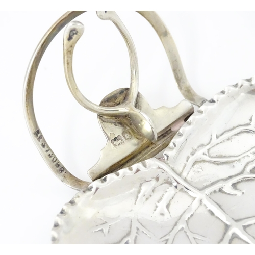 265 - A Silver menu holder / table place card holder with wishbone detail and leaf formed dished section. ... 