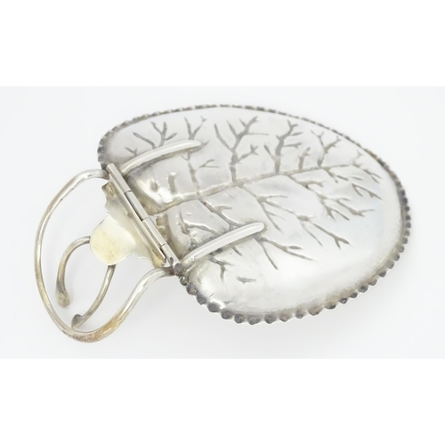 265 - A Silver menu holder / table place card holder with wishbone detail and leaf formed dished section. ... 