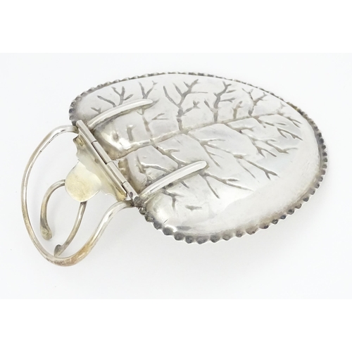 265 - A Silver menu holder / table place card holder with wishbone detail and leaf formed dished section. ... 