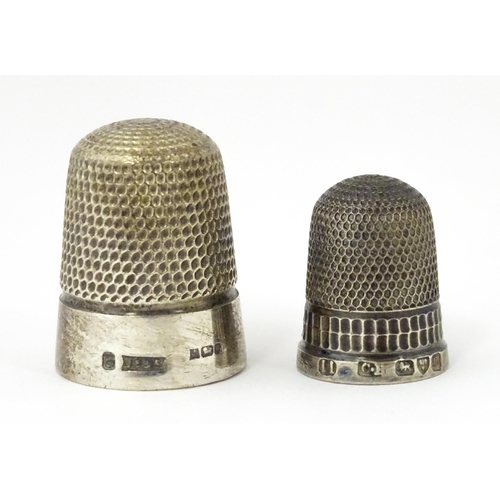 267 - Two silver thimbles, one hallmarked Chester 1904 maker Charles Horner. The other Birmingham 1975 mak... 