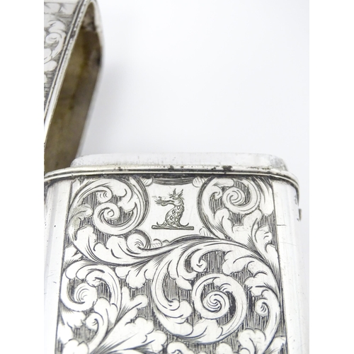 268 - A white metal / silver plate cigar box with engraved acanthus scroll decoration. Approx. 5 1/4