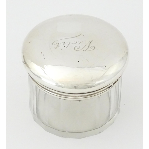 269 - A glass dressing table jar with silver screw top lid hallmarked London 1920, maker Mappin & Webb. Ap... 