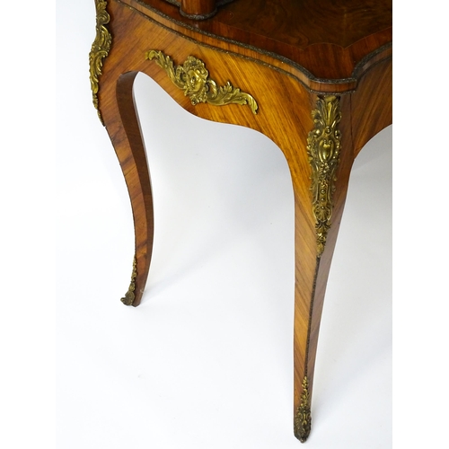 1440 - A mid 19thC Bonheur du jour with burr walnut, walnut and kingwood veneers. The top having a porcelai... 