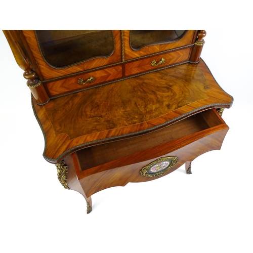 1440 - A mid 19thC Bonheur du jour with burr walnut, walnut and kingwood veneers. The top having a porcelai... 