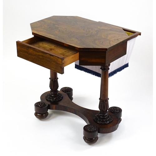 1451 - A William IV rosewood sewing table with an octagonal top above a short drawer and opposing deep well... 