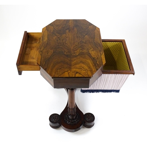 1451 - A William IV rosewood sewing table with an octagonal top above a short drawer and opposing deep well... 