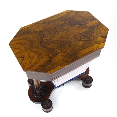 1451 - A William IV rosewood sewing table with an octagonal top above a short drawer and opposing deep well... 