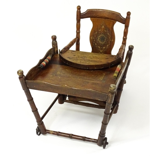 1476 - A late Victorian metamorphic child's high chair that can transition into a low chair with an abacus ... 