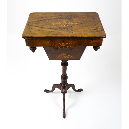 1481 - A late 19thC walnut sewing table with a marquetry inlaid top above an associated turned pedestal rai... 