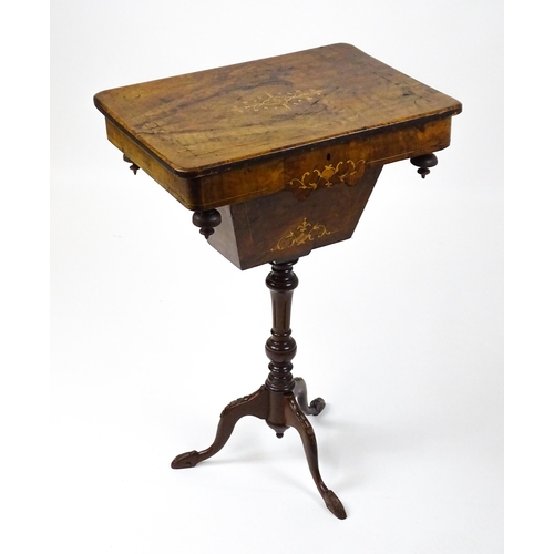 1481 - A late 19thC walnut sewing table with a marquetry inlaid top above an associated turned pedestal rai... 