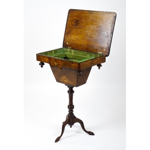 1481 - A late 19thC walnut sewing table with a marquetry inlaid top above an associated turned pedestal rai... 