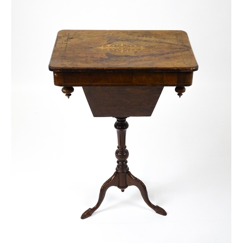 1481 - A late 19thC walnut sewing table with a marquetry inlaid top above an associated turned pedestal rai... 