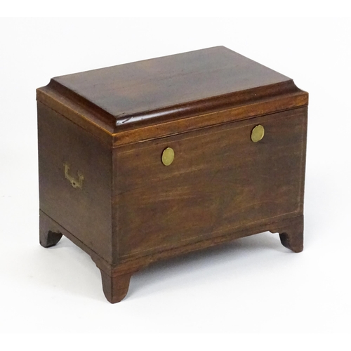 1483 - A mid 19thC mahogany campaign style wine cooler, with a hinged lid opening to show a tin insert. The... 