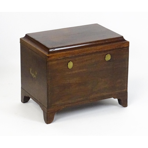 1483 - A mid 19thC mahogany campaign style wine cooler, with a hinged lid opening to show a tin insert. The... 