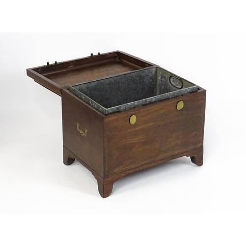 1483 - A mid 19thC mahogany campaign style wine cooler, with a hinged lid opening to show a tin insert. The... 