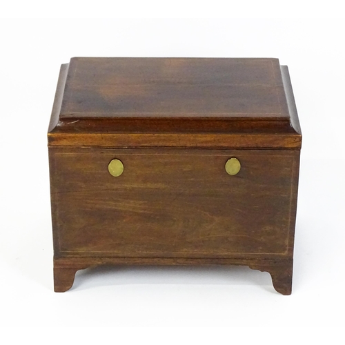 1483 - A mid 19thC mahogany campaign style wine cooler, with a hinged lid opening to show a tin insert. The... 