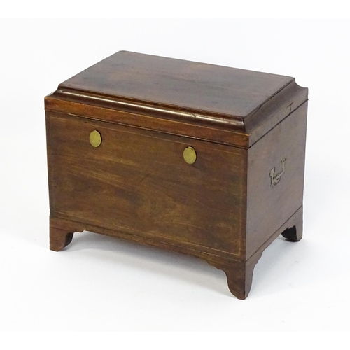 1483 - A mid 19thC mahogany campaign style wine cooler, with a hinged lid opening to show a tin insert. The... 