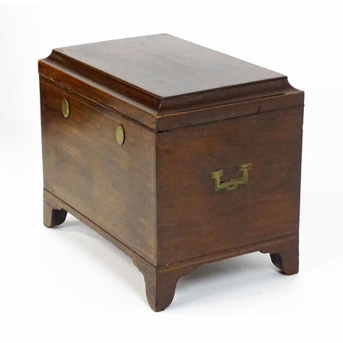 1483 - A mid 19thC mahogany campaign style wine cooler, with a hinged lid opening to show a tin insert. The... 