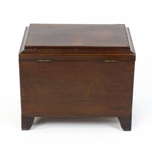 1483 - A mid 19thC mahogany campaign style wine cooler, with a hinged lid opening to show a tin insert. The... 