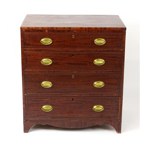 1485 - A Regency period mahogany chest of drawers with four long drawers raised on splayed bracket feet. 33... 