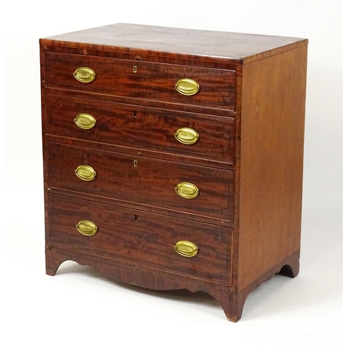 1485 - A Regency period mahogany chest of drawers with four long drawers raised on splayed bracket feet. 33... 