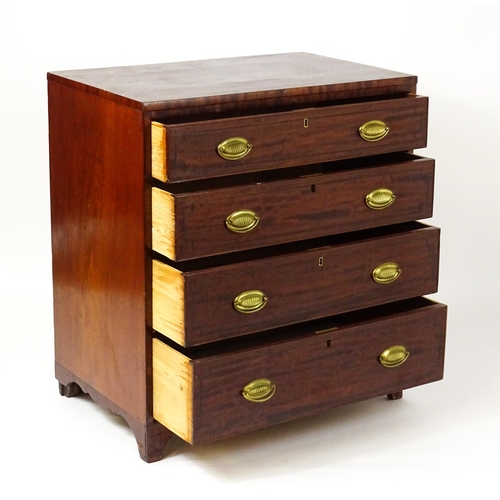 1485 - A Regency period mahogany chest of drawers with four long drawers raised on splayed bracket feet. 33... 