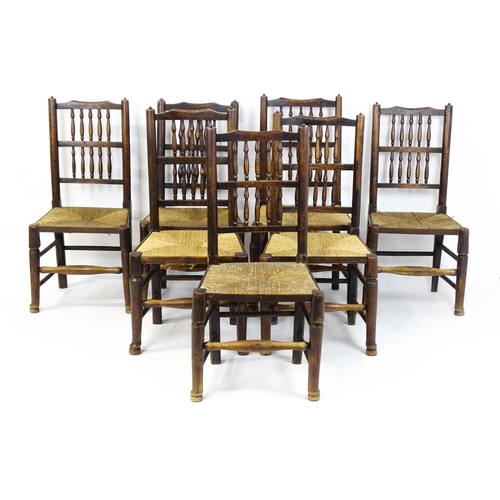 1490 - A group of seven 19thC spindle back dining chairs with envelope rush seats. 18