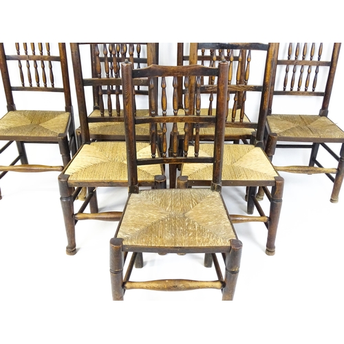 1490 - A group of seven 19thC spindle back dining chairs with envelope rush seats. 18