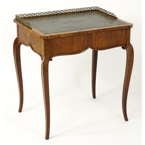 1496 - A 19thC satinwood writing desk surmounted by a bras pierced gallery above a single short drawer with... 