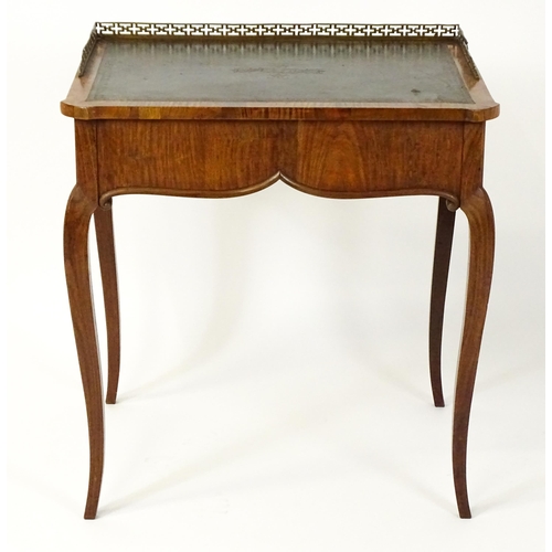 1496 - A 19thC satinwood writing desk surmounted by a bras pierced gallery above a single short drawer with... 