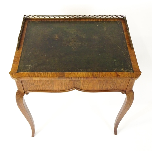 1496 - A 19thC satinwood writing desk surmounted by a bras pierced gallery above a single short drawer with... 