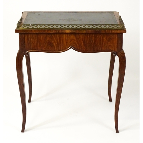 1496 - A 19thC satinwood writing desk surmounted by a bras pierced gallery above a single short drawer with... 