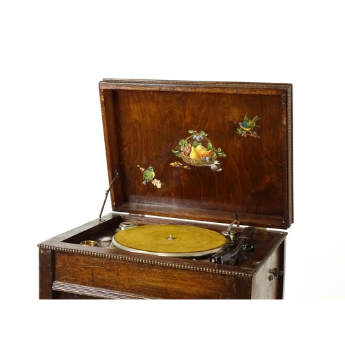 1504 - A c1930s radiogram, the upper section fitted with a Garrard turntable above a Dulci radio tuner and ... 