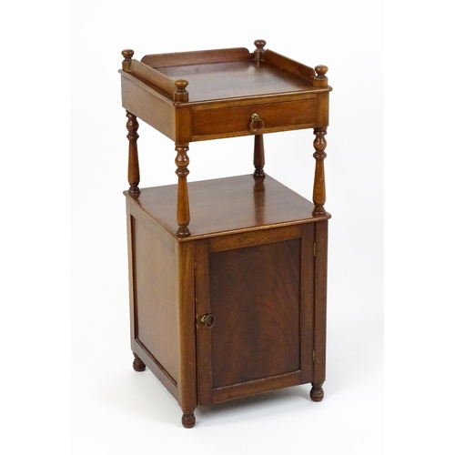 1510 - A late 19thC mahogany bedside cabinet with turned uprights, a single short drawer and a panelled cup... 