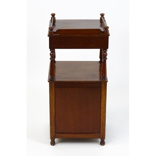 1510 - A late 19thC mahogany bedside cabinet with turned uprights, a single short drawer and a panelled cup... 