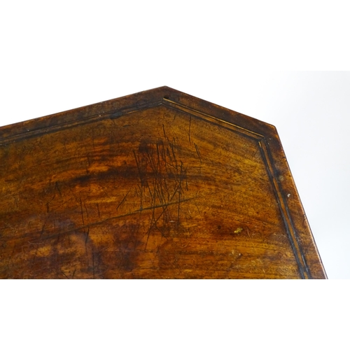 1532 - An early / mid 19thC mahogany sewing table with a crossbanded, hinged lid above a single short drawe... 