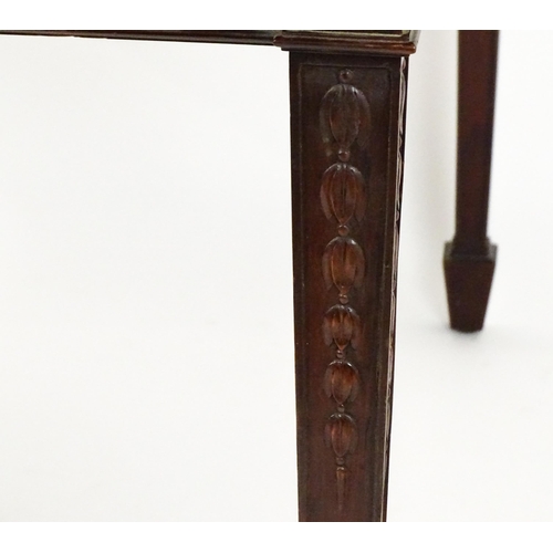 1538 - An early 20thC mahogany Waring and Gillows dining table comprised of two demi lune end tables and a ... 