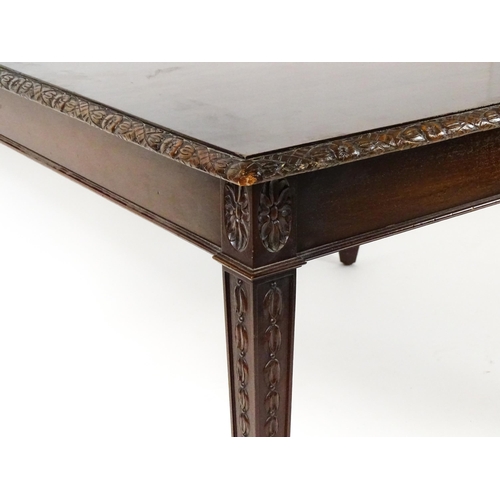 1538 - An early 20thC mahogany Waring and Gillows dining table comprised of two demi lune end tables and a ... 