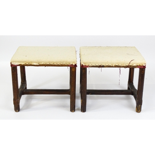 1543 - A pair of Georgian walnut stools raised on chamfered legs and supported by chamfered stretchers. 21