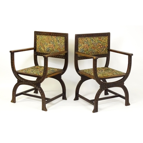 1563 - A pair of late 19thC / early 20thC x-frame armchairs with William Morris upholstery. 23