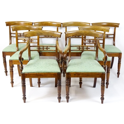 1575 - A set of eight late 19thC / early 20thC mahogany dining chairs with bowed backrests above carved mid... 