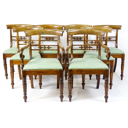 1575 - A set of eight late 19thC / early 20thC mahogany dining chairs with bowed backrests above carved mid... 