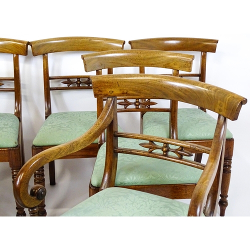 1575 - A set of eight late 19thC / early 20thC mahogany dining chairs with bowed backrests above carved mid... 