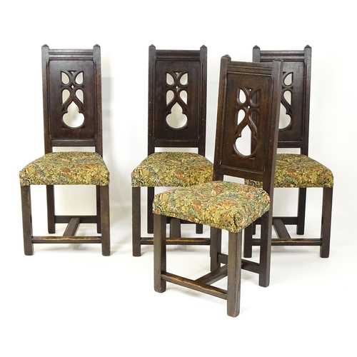 1580 - A set of four late 19thC Gothic revival chairs, having pierced back splits. Morris upholstery and ra... 