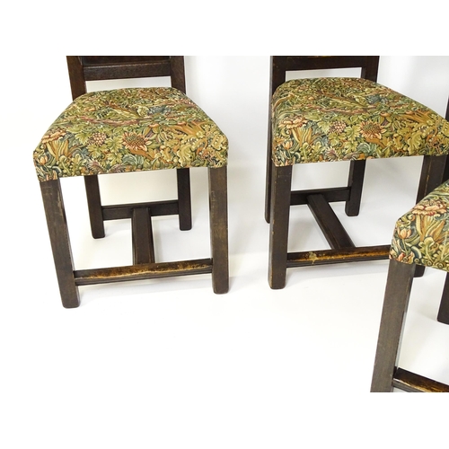 1580 - A set of four late 19thC Gothic revival chairs, having pierced back splits. Morris upholstery and ra... 