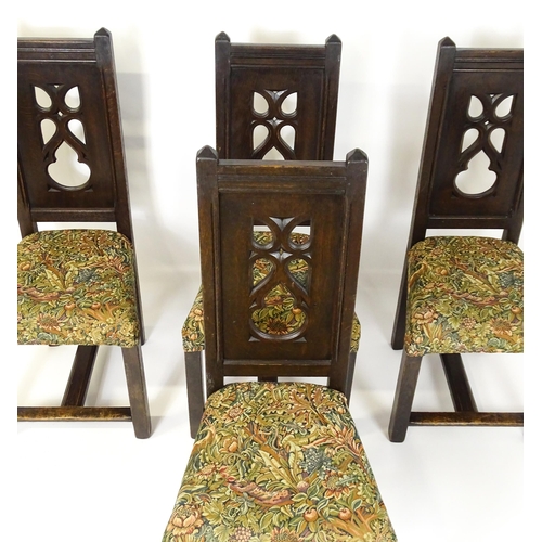 1580 - A set of four late 19thC Gothic revival chairs, having pierced back splits. Morris upholstery and ra... 