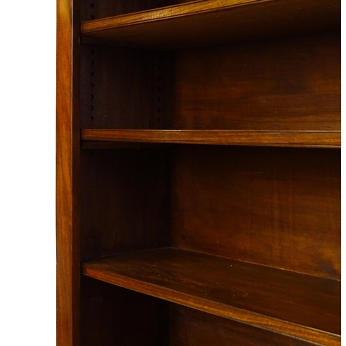 1470 - A late 19thC mahogany bookcase with a moulded cornice above four adjustable shelves. 56