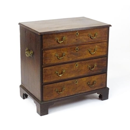 1484 - A late 18thC mahogany bachelors chest of drawers, the chest of drawers comprising four long drawers ... 